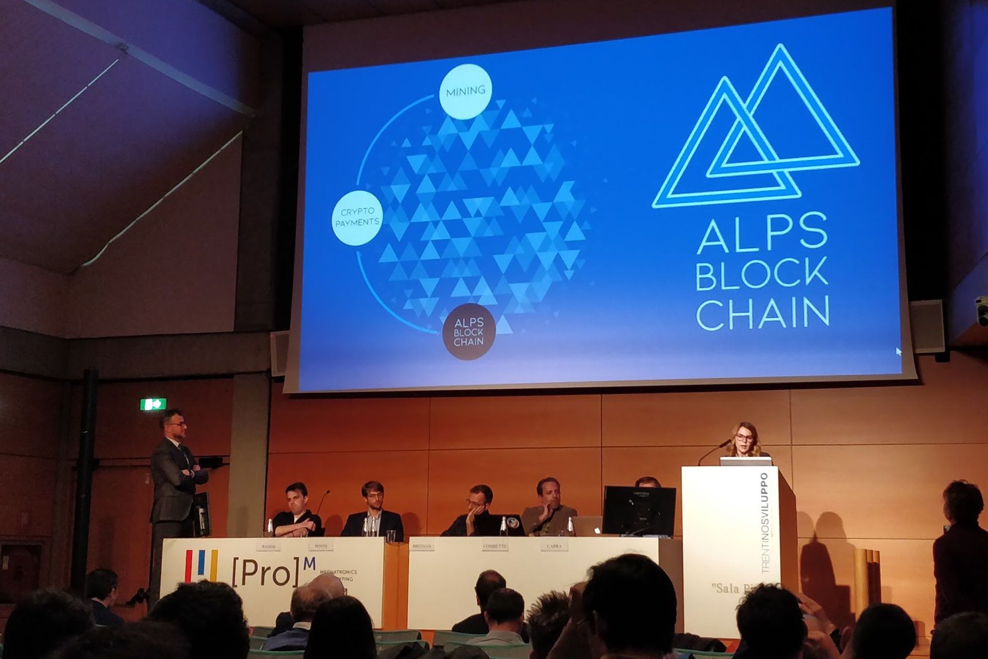 Un'occasione di presentazione della start-up trentina Alps Blockchain, fondata da Francesco Buffa e Francesca Failoni, che realizza delle “mining farm” nelle centrali idroelettriche e che rivende sul mercato la potenza di calcolo “green” generata