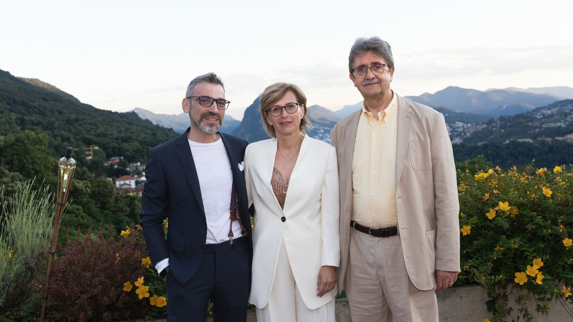 Luca Mauriello en Cristina Giotto, respectievelijk Vice President en President van ated-ICT Ticino, met partner Silvano Marioni