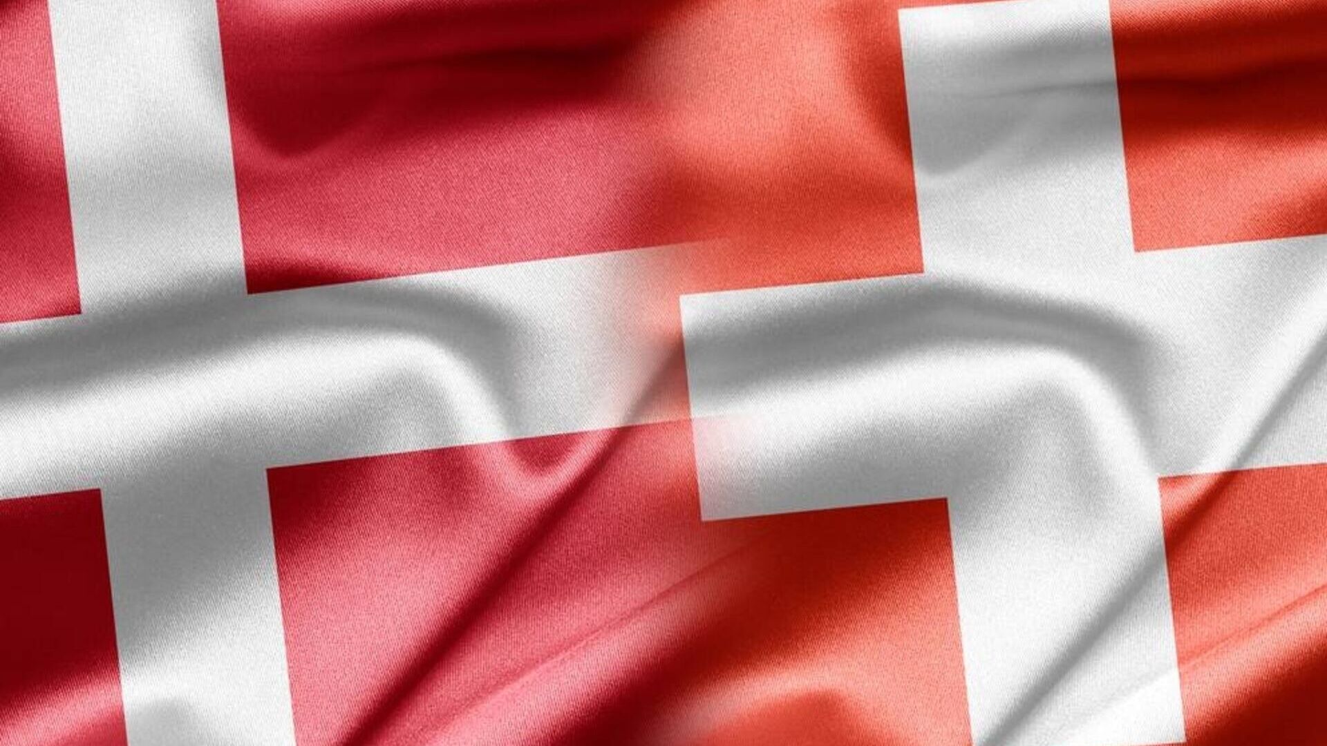Suíça Dinamarca: uma fusão gráfica entre as bandeiras da Confederação e do Reino
